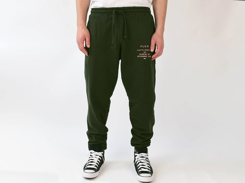 SUPPLEMENT TRACK PANT. HUNTER GREEN